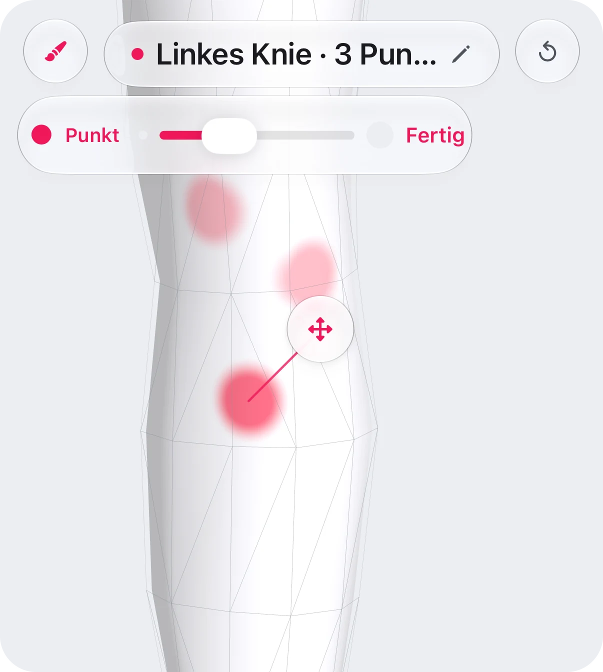 Die Auswahl der Körperstelle im Modus „Punkt“ am linken Knie: drei getrennte Punkte, der neueste mit einem Griff zum Verschieben, oben die Leiste, die „Linkes Knie“ und drei Punkte nennt, und darunter „Punkt“ mit dem Regler für die Punktgröße und „Fertig“.